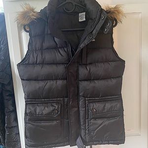 Black puffer vest with faux fur hoodie